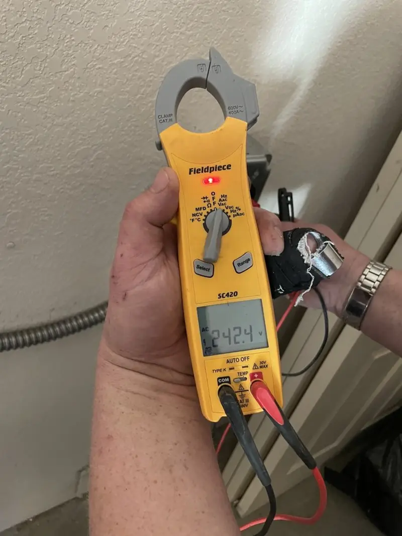 Voltage testing with clamp meter during Generator Installation in Wellsboro